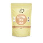 Pale yellow Eden Healthfoods Electra-Lyte Pineapple and Apple pouch standing upright, with a tan circular title panel and a horizontal band reading Electrolytes, BCAAs, Minerals.