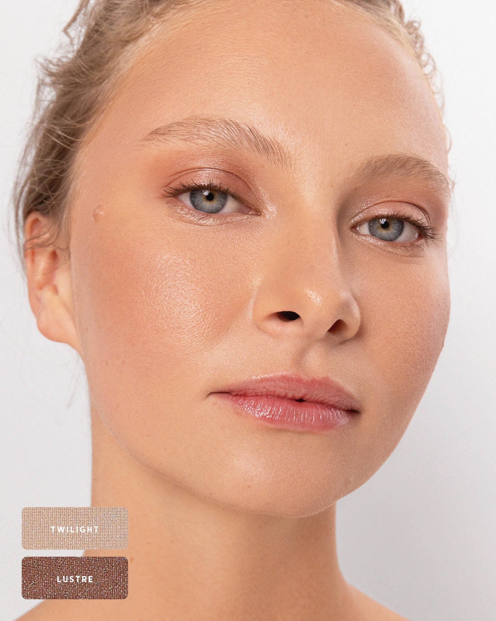 Blonde model wearing a soft pearly and bronze eye look from the Ere Perez Light Shimmer palette, with Twilight and Lustre shade swatches at the lower left.
