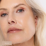 Close-up of a silver-haired model wearing softly blended rose-bronze shimmer on the eyelids. Twilight and Lustre swatches identify the Ere Perez Light Shimmer palette shades used.