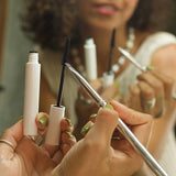 Ere Perez Eco Vegan Essential Brush Set – spoolie and brushes used at a mirror
