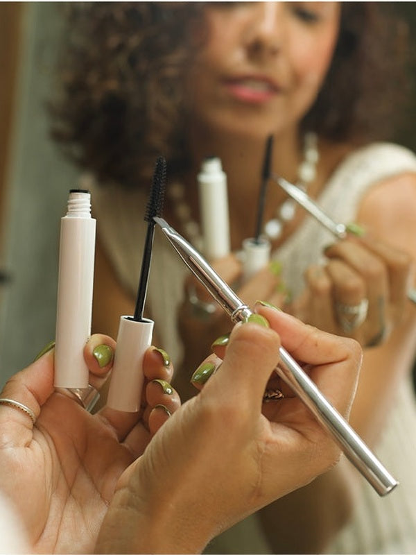 Ere Perez Eco Vegan Essential Brush Set – spoolie and brushes used at a mirror
