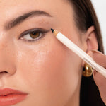 Model applying Ere Perez Jojoba Eye Pencil