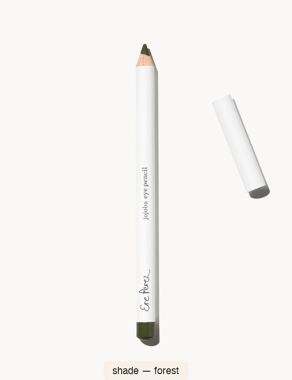 White Ere Perez Jojoba Eye Pencil in Forest, with an exposed olive-green tip, a matching dark green end cap and its white lid beside it; the shade name appears below.