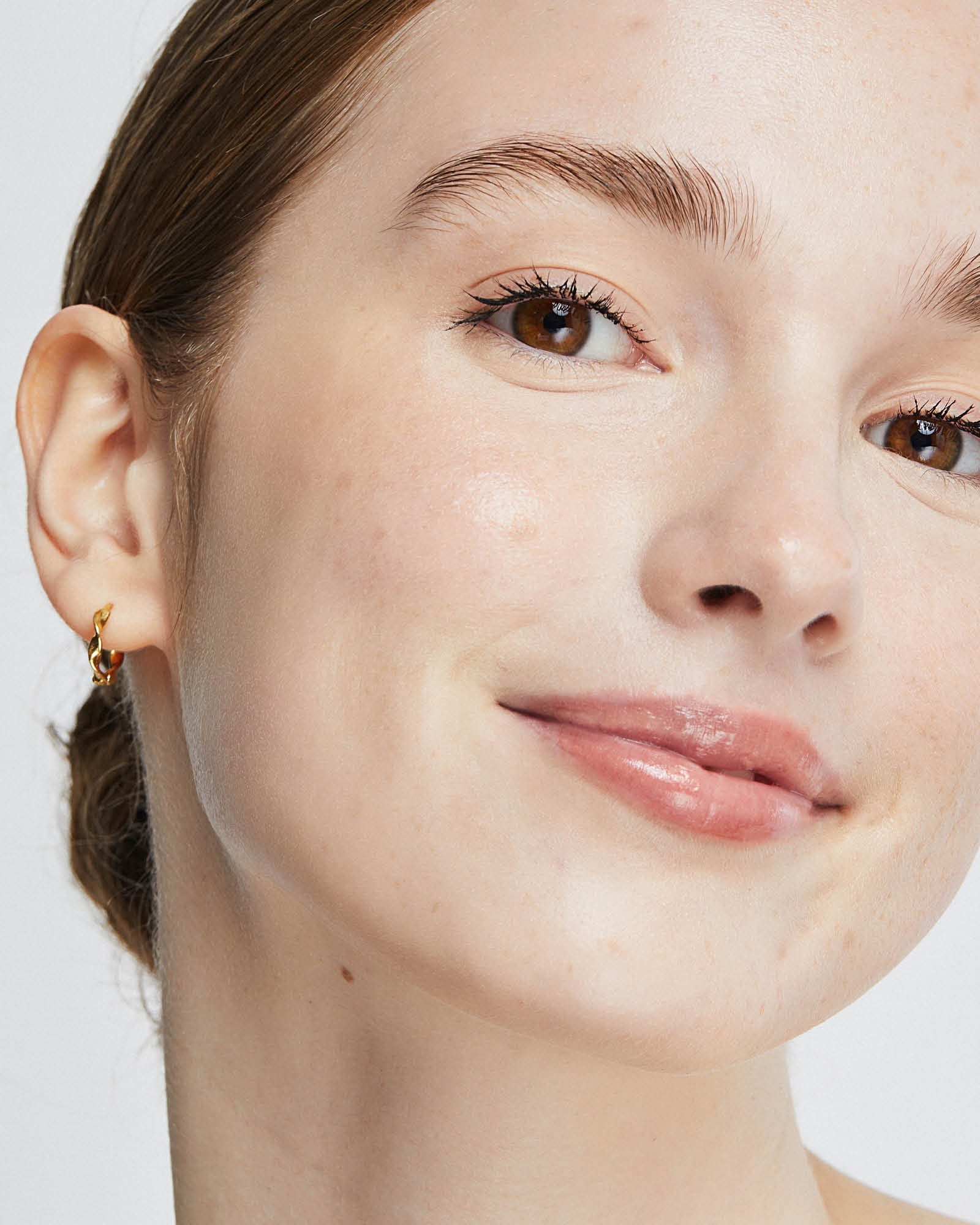 Ere Perez Oat Milk Foundation shown on a model