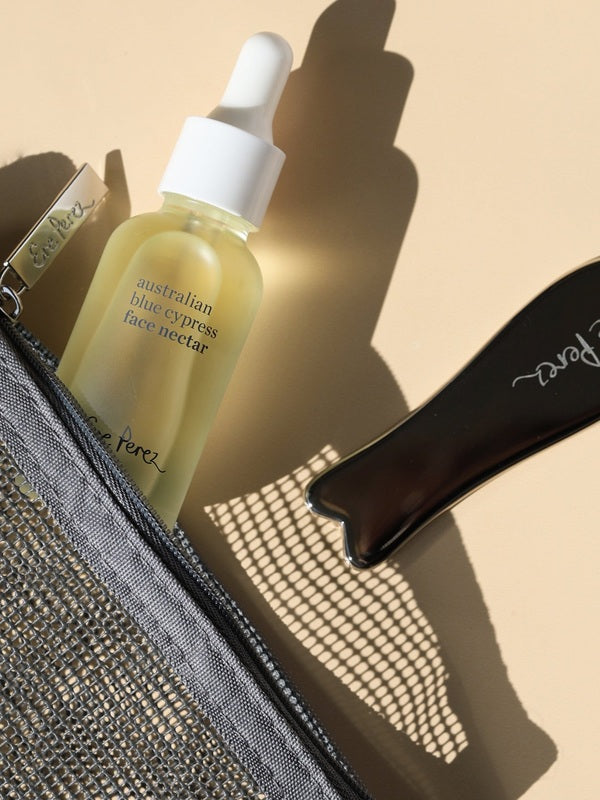 Ere Perez Self-Care Duo – face nectar and steel face tool styled together