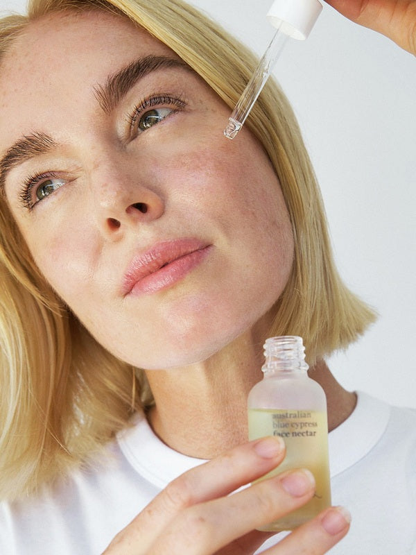 Ere Perez Self-Care Duo – face nectar applied with a dropper