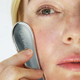 Ere Perez Self-Care Duo – steel face tool used on the cheek