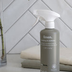 Euclove Linen Spray styled with linen and eucalyptus