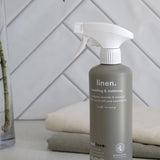 Euclove Linen Spray styled with linen and eucalyptus