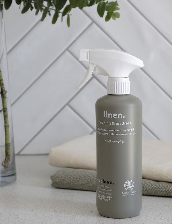 Euclove Linen Spray styled with linen and eucalyptus