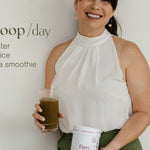 Woman holding Natural Health by Meah Fem21 and a prepared green drink