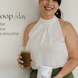 Woman holding Natural Health by Meah Fem21 and a prepared green drink