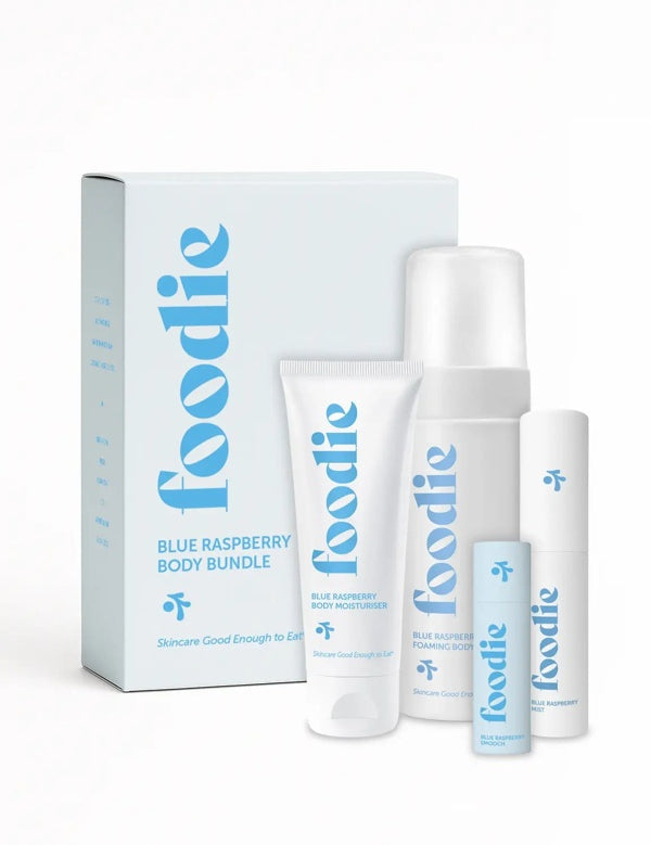 Vanessa Megan Foodie Blue Raspberry four-piece Body Bundle: foaming body wash, body moisturiser, face and body mist, and lip balm standing with the matching gift box against a light background.