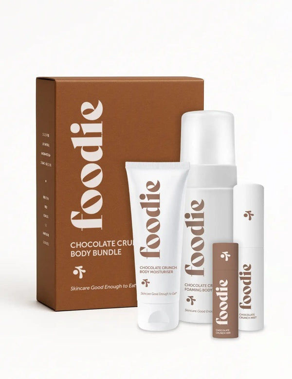 Vanessa Megan Foodie Chocolate Crunch four-piece Body Bundle: foaming body wash, body moisturiser, face and body mist, and lip balm standing with the matching gift box against a light background.