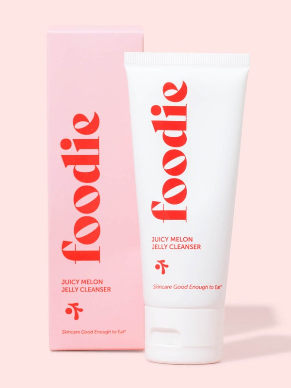 Vanessa Megan Foodie Juicy Melon Jelly Cleanser 75ml tube standing beside its matching pink carton on a pink surface.