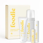 Vanessa Megan Foodie Pineapple Crush four-piece Body Bundle: foaming body wash, body moisturiser, face and body mist, and lip balm standing with the matching gift box against a light background.