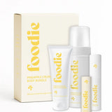 Vanessa Megan Foodie Pineapple Crush four-piece Body Bundle: foaming body wash, body moisturiser, face and body mist, and lip balm standing with the matching gift box against a light background.