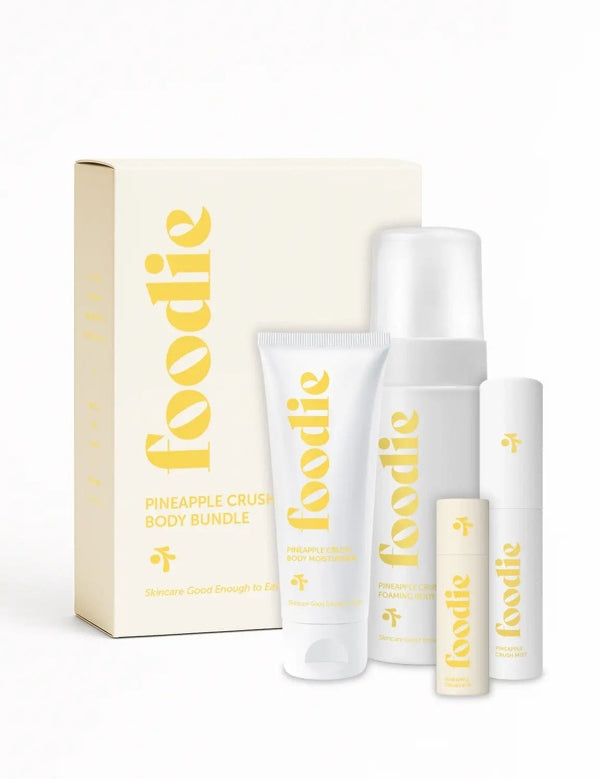 Vanessa Megan Foodie Pineapple Crush four-piece Body Bundle: foaming body wash, body moisturiser, face and body mist, and lip balm standing with the matching gift box against a light background.