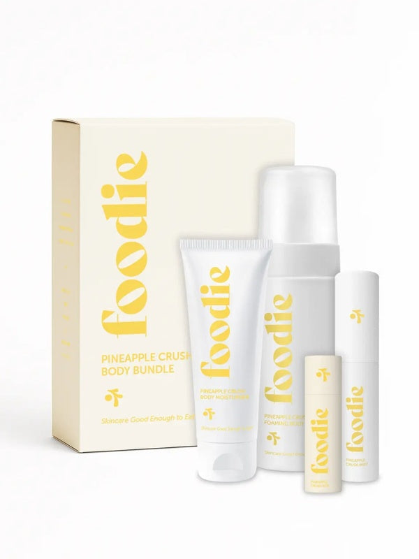 Vanessa Megan Foodie Pineapple Crush four-piece Body Bundle: foaming body wash, body moisturiser, face and body mist, and lip balm standing with the matching gift box against a light background.