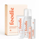 Vanessa Megan Foodie Tropical Pavlova four-piece Body Bundle: foaming body wash, body moisturiser, face and body mist, and lip balm standing with the matching gift box against a light background.