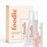 Vanessa Megan Foodie Tropical Pavlova four-piece Body Bundle: foaming body wash, body moisturiser, face and body mist, and lip balm standing with the matching gift box against a light background.