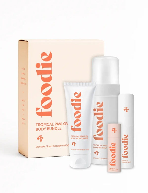 Vanessa Megan Foodie Tropical Pavlova four-piece Body Bundle: foaming body wash, body moisturiser, face and body mist, and lip balm standing with the matching gift box against a light background.