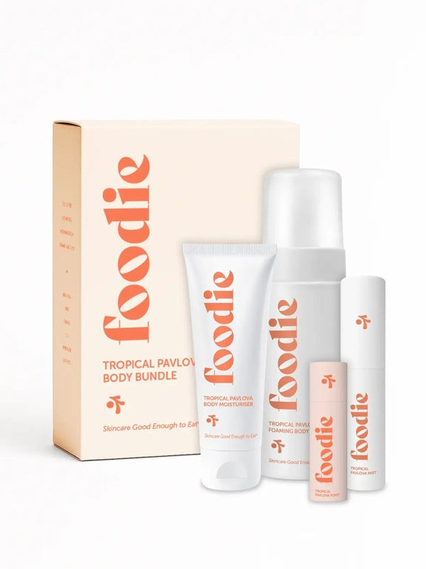 Vanessa Megan Foodie Tropical Pavlova four-piece Body Bundle: foaming body wash, body moisturiser, face and body mist, and lip balm standing with the matching gift box against a light background.