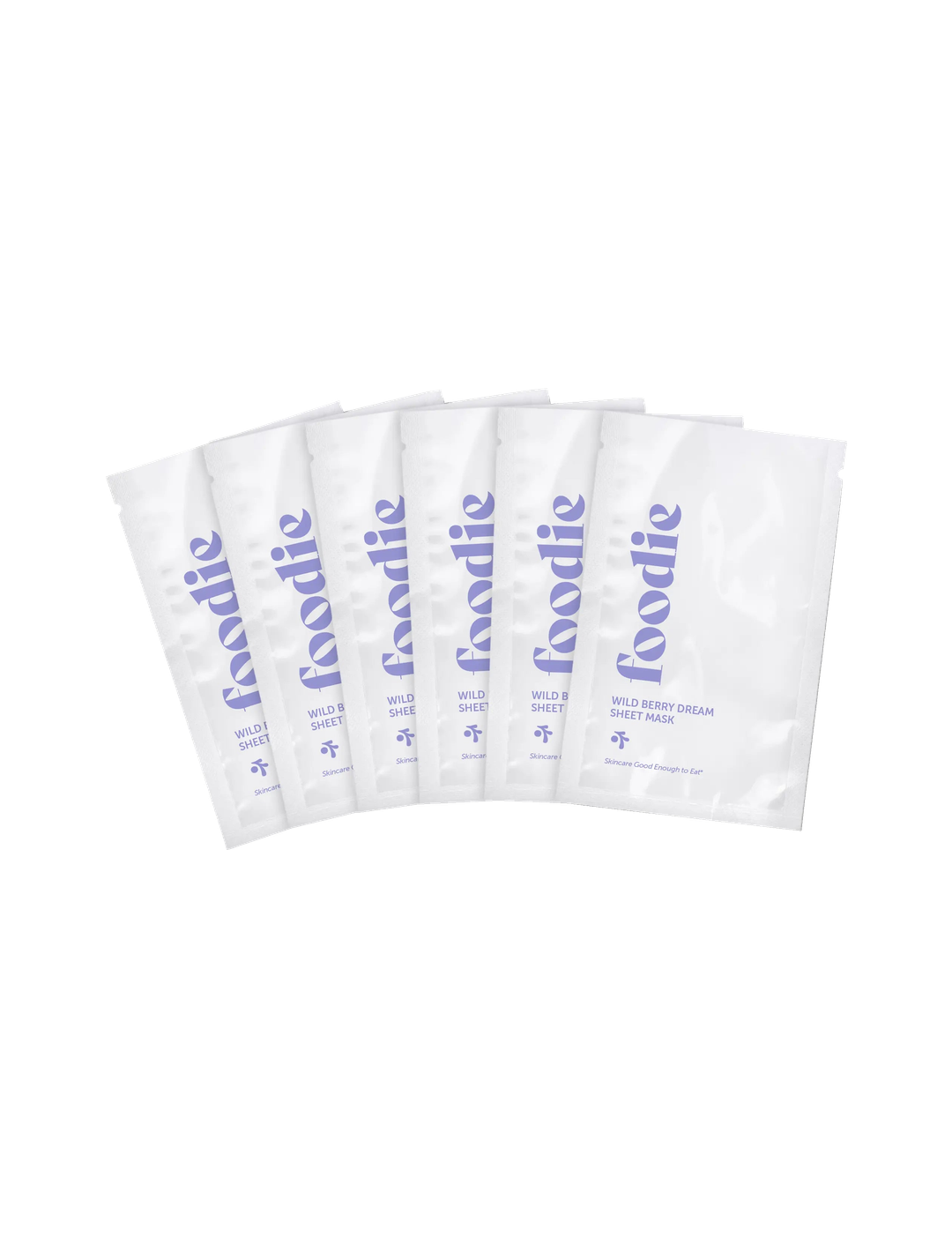 Foodie Wild Berry Dream Sheet Mask 6-Pack, showing six white individual sachets arranged in a fan, with purple Foodie logos and Wild Berry Dream labels on a plain white background.