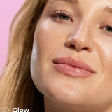 Model showing a glowing complexion after using Weleda Glow Perfecting Serum Booster Drops