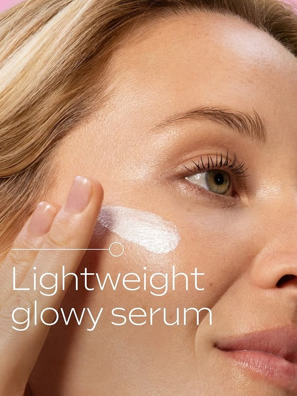 Lightweight glowy texture of Weleda Glow Perfecting Serum Booster Drops applied to the cheek