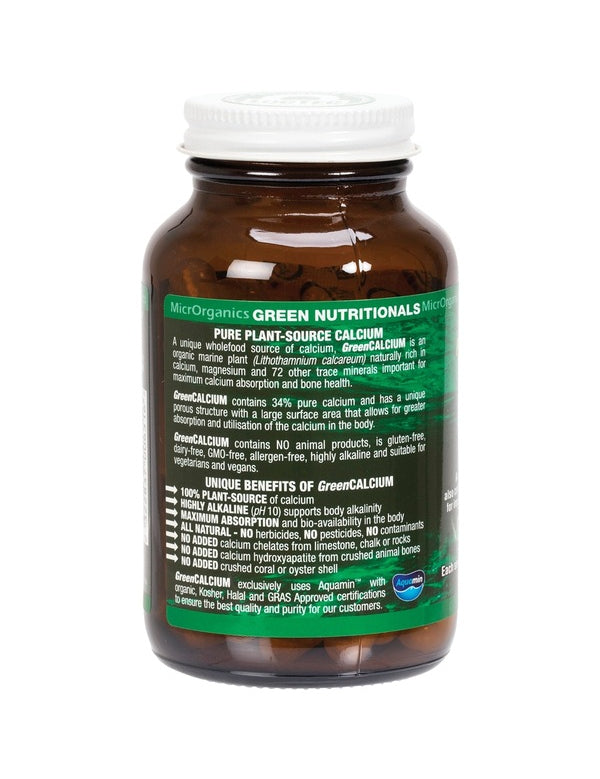 Side of an amber Green Nutritionals Green Calcium bottle, showing white product information and ingredient text on a dark green label beneath a white lid.