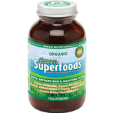 Amber Green Nutritionals Organic Green Superfoods powder jar with a silver screw lid and a green-and-blue label depicting grass, sky and large white Superfoods lettering.