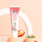 Grin Kids Strawberry Toothpaste styled with strawberries