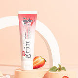 Grin Kids Strawberry Toothpaste styled with strawberries