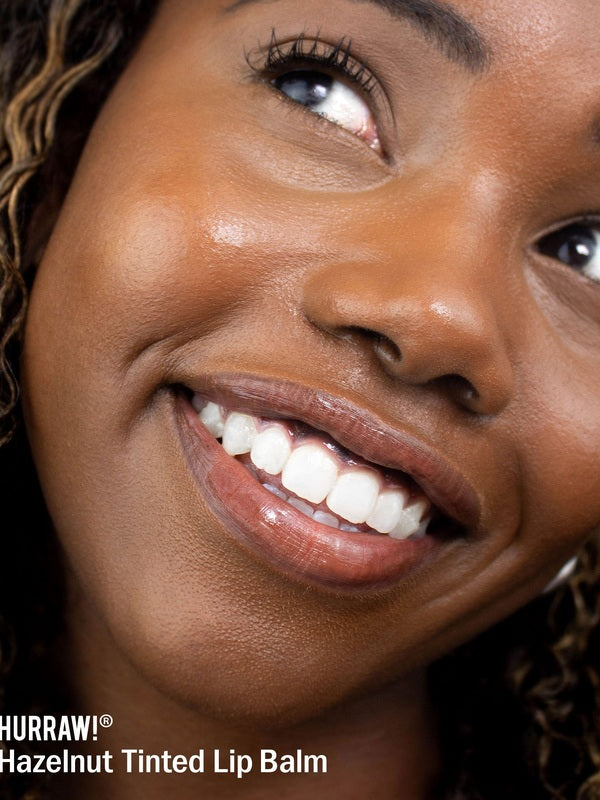 Woman wearing Hurraw! Hazelnut Tinted Lip Balm – Hurraw! Organic Lip Balm - Hazelnut 4.8g