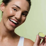 Botani Healing Lip Balm 10g — model holding healing lip balm