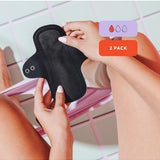 Hello Period reusable liner held in hand with absorbency details