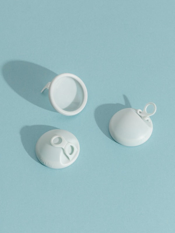 Hello Period menstrual discs in soft blue studio styling
