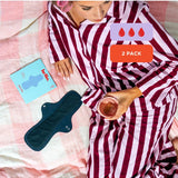 Hello Period Overnight Success pad in a relaxed bedtime setting