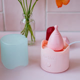 Hello Period cup inside the Steamy steriliser in a bathroom setting