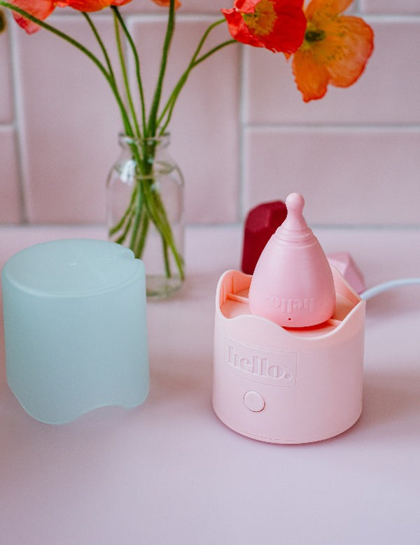 Hello Period cup inside the Steamy steriliser in a bathroom setting