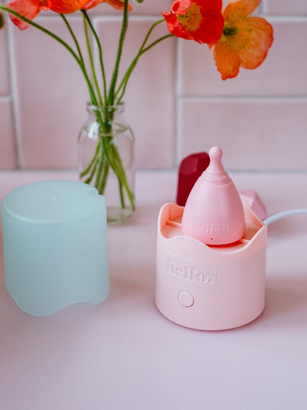 Hello Period cup inside the Steamy steriliser in a bathroom setting
