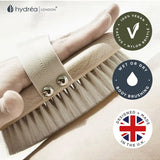 Hydrea Professional Vegan Dry Body Brush held in hand for body brushing