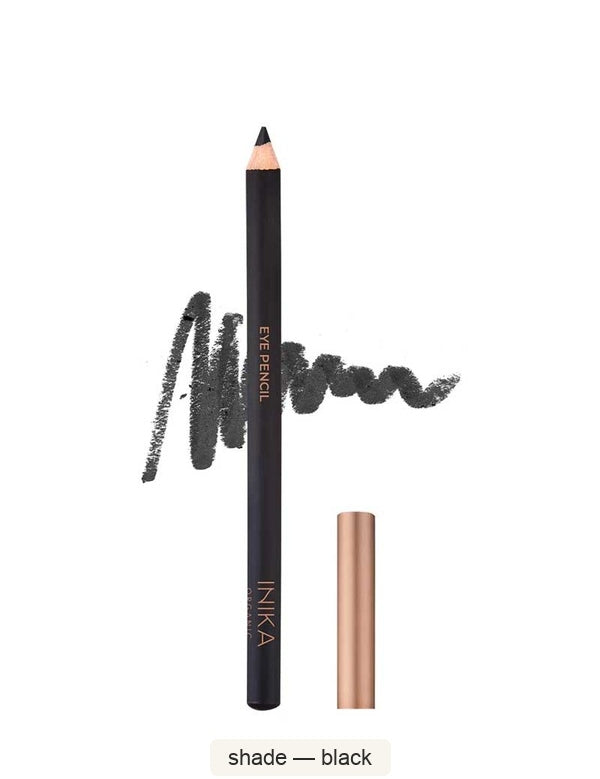 Black INIKA eyeliner pencil standing beside its bronze cap, with a black scribbled colour swatch behind it. The caption identifies the shade as Black.