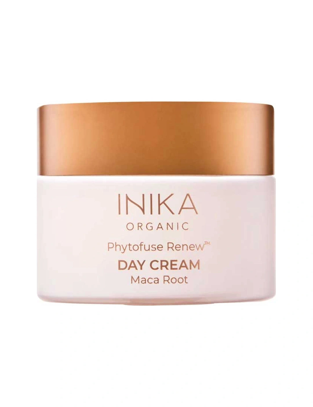 Round pale pink INIKA Phytofuse Renew Day Cream jar with a broad gold lid and gold lettering naming Maca Root, against a white background.