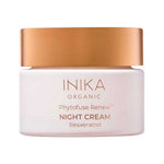 Round pale pink INIKA Phytofuse Renew Night Cream jar with a broad gold lid and gold lettering naming Resveratrol, against a white background.
