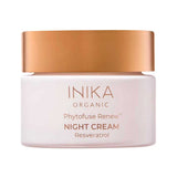 Round pale pink INIKA Phytofuse Renew Night Cream jar with a broad gold lid and gold lettering naming Resveratrol, against a white background.