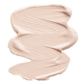 A smooth, creamy swirl of light beige INIKA Organic Sheer Coverage Concealer 10ml with a silky texture is shown on a white background. The word "Porcelain" appears below the swatch, indicating the shade.