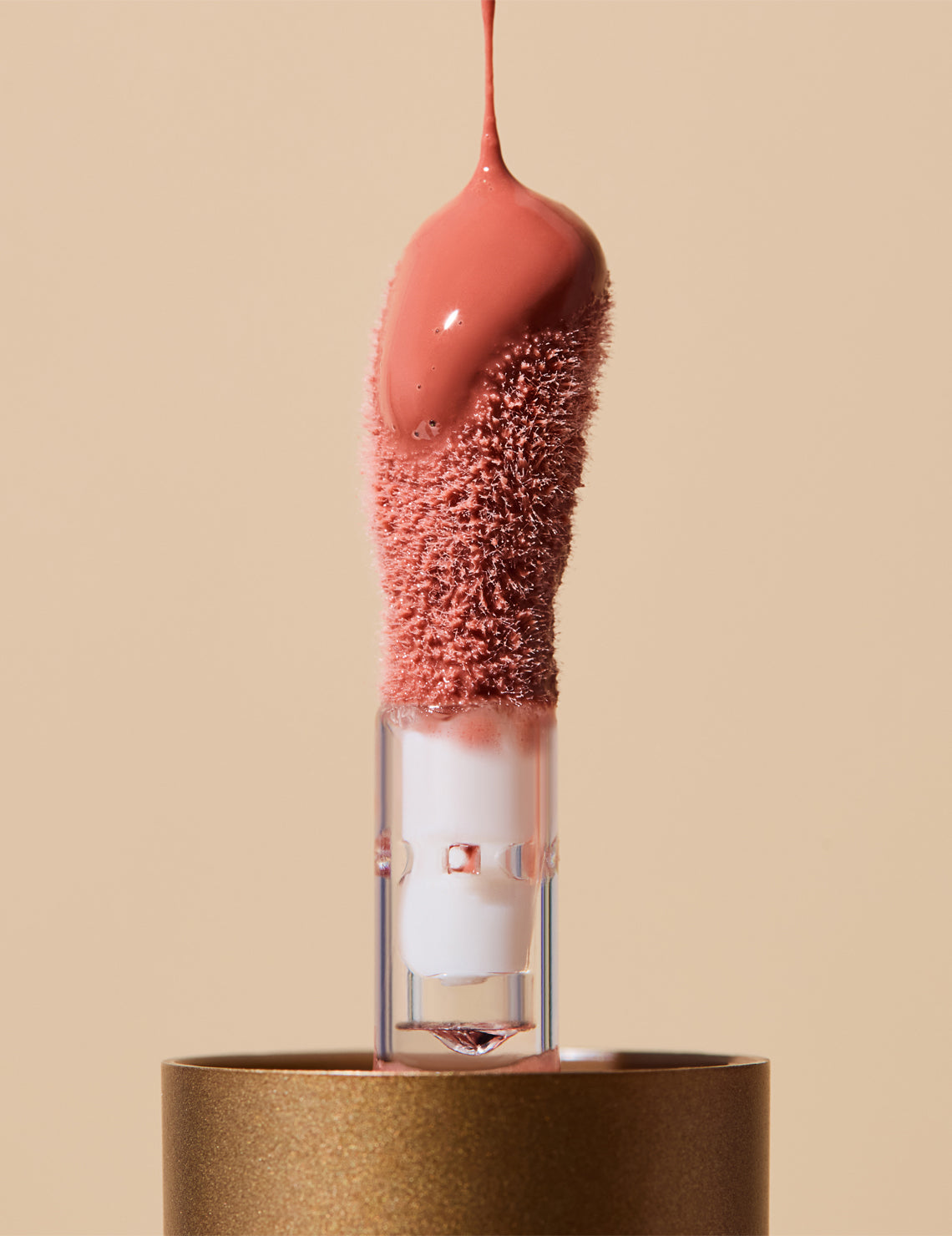 Close-up of INIKA Organic Tinted Lip Oil applicator