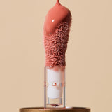 Close-up of INIKA Organic Tinted Lip Oil applicator